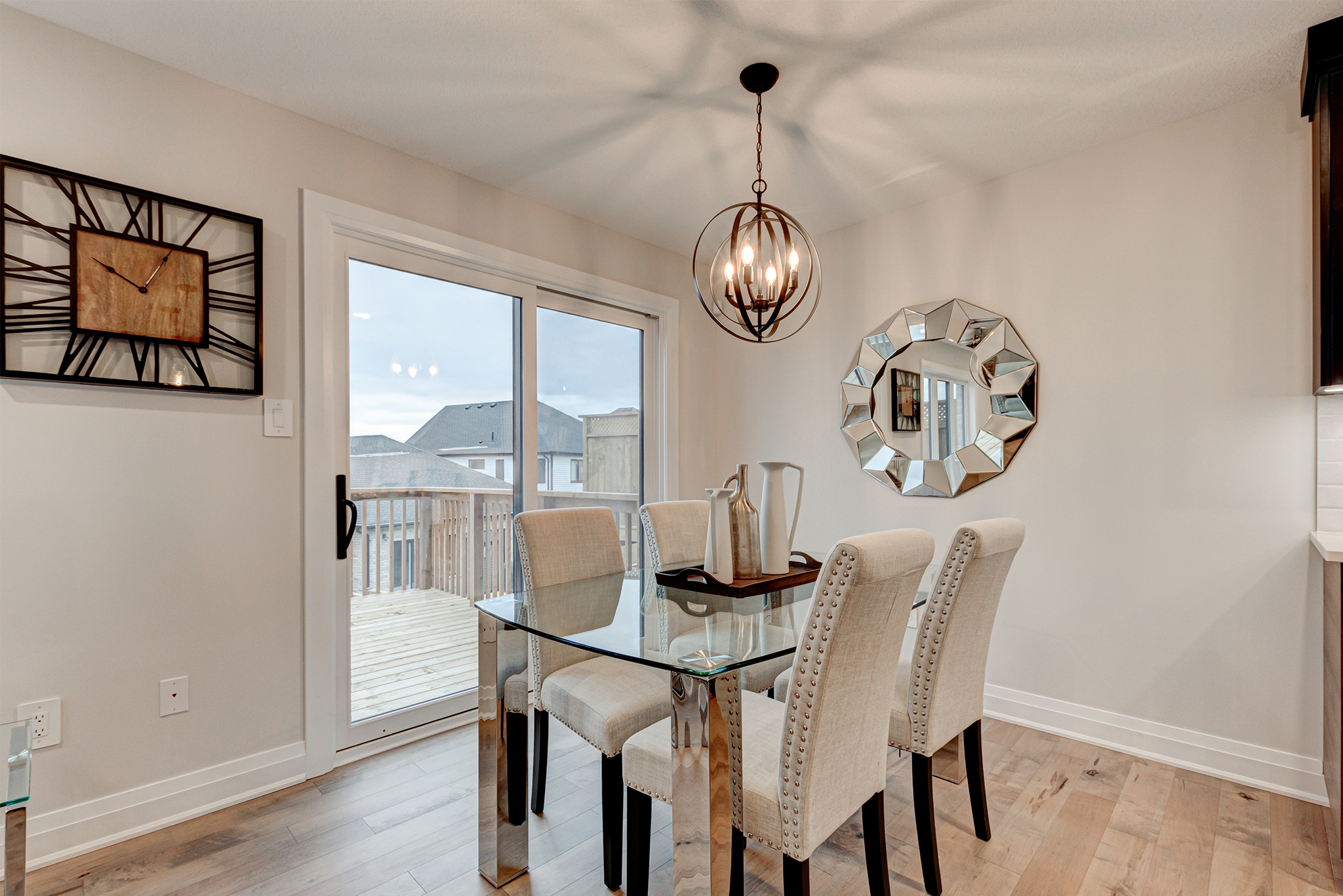 Dining area overlooking the deck in a Rembrandt home.