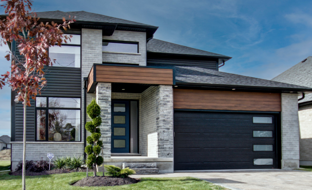 Exterior view of a home at Rembrandt Walk – a single family condo community by Rembrandt Homes